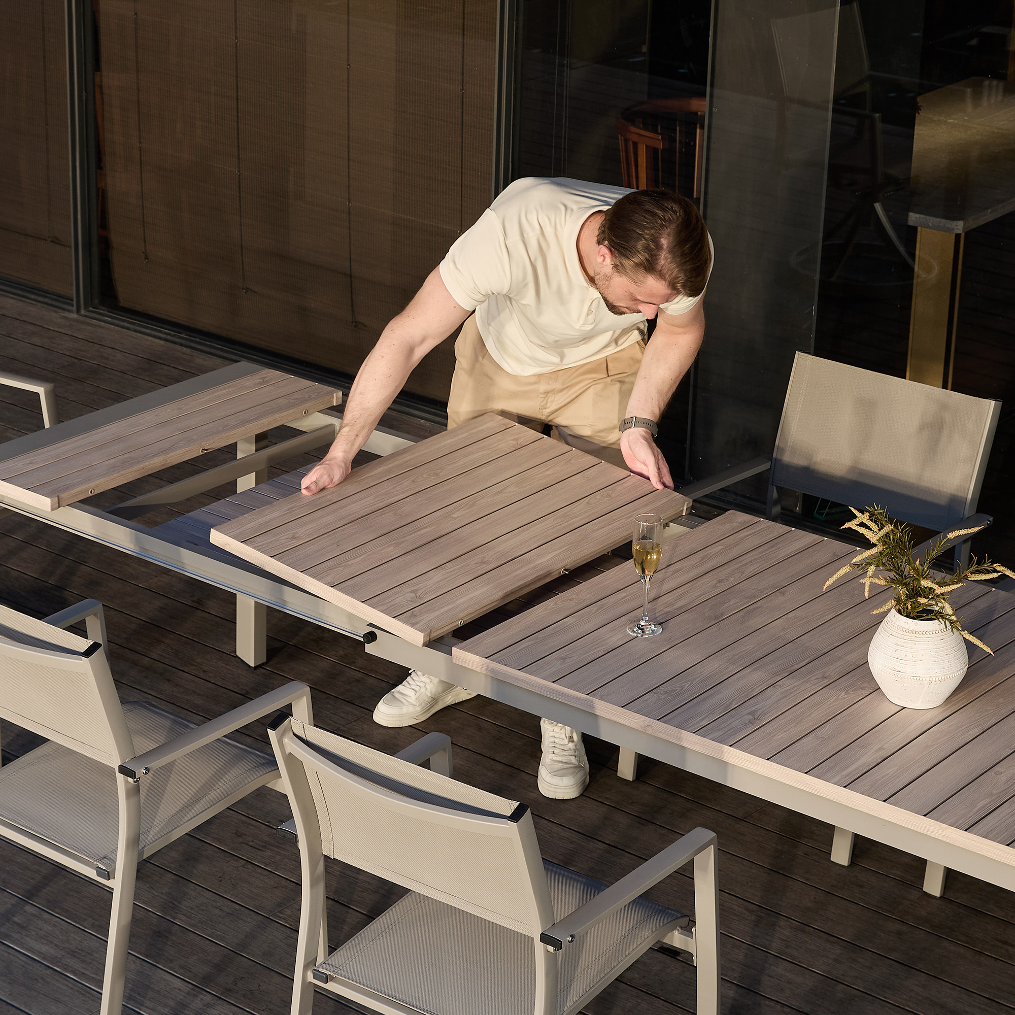 Crafted with an extendable outdoor dining table with wooden top and metal frame, this piece outdoor patio set offers durability and style. - Seehill