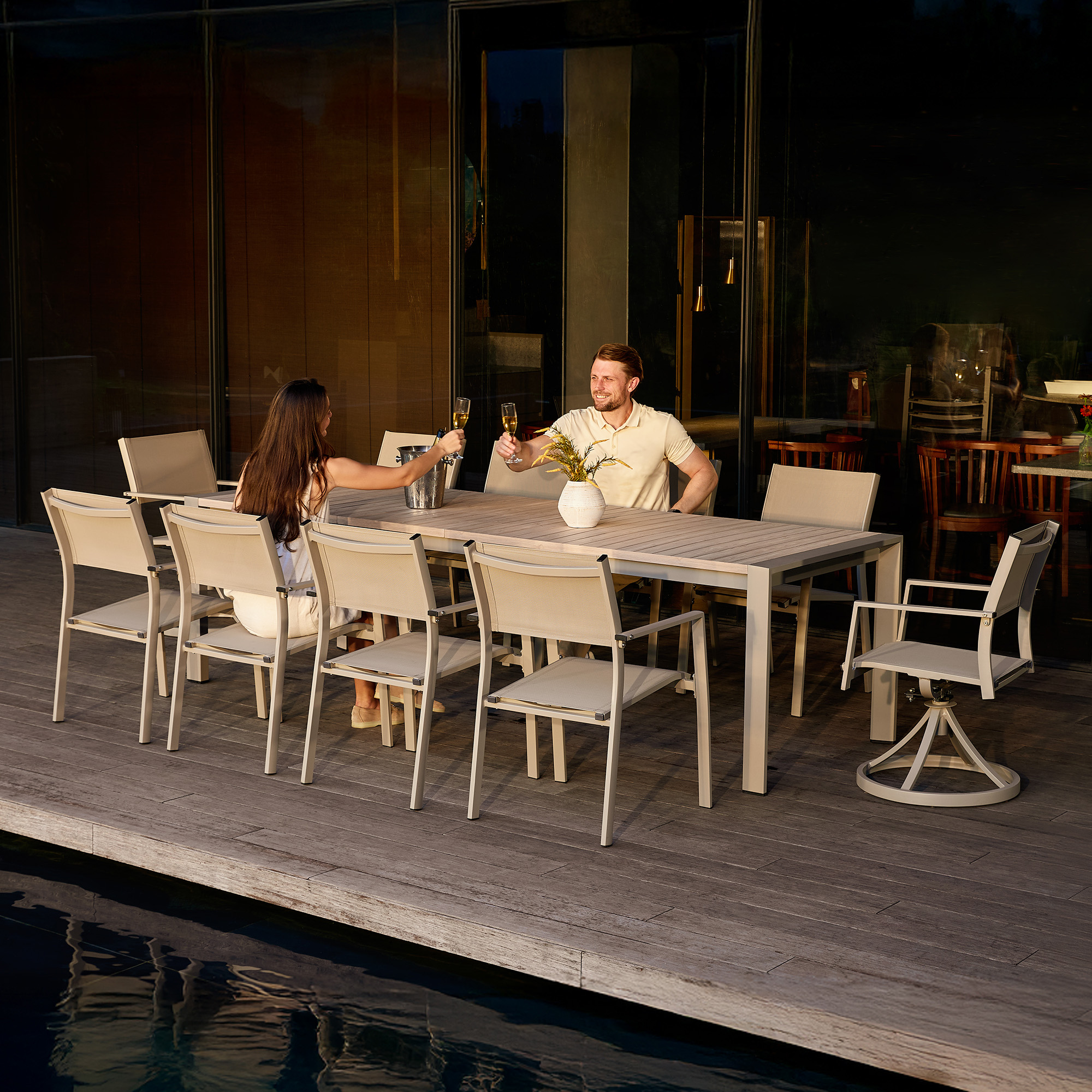 Experience the modern outdoor dining set with wooden table and beige chairs in our sophisticated collection. - Seehill