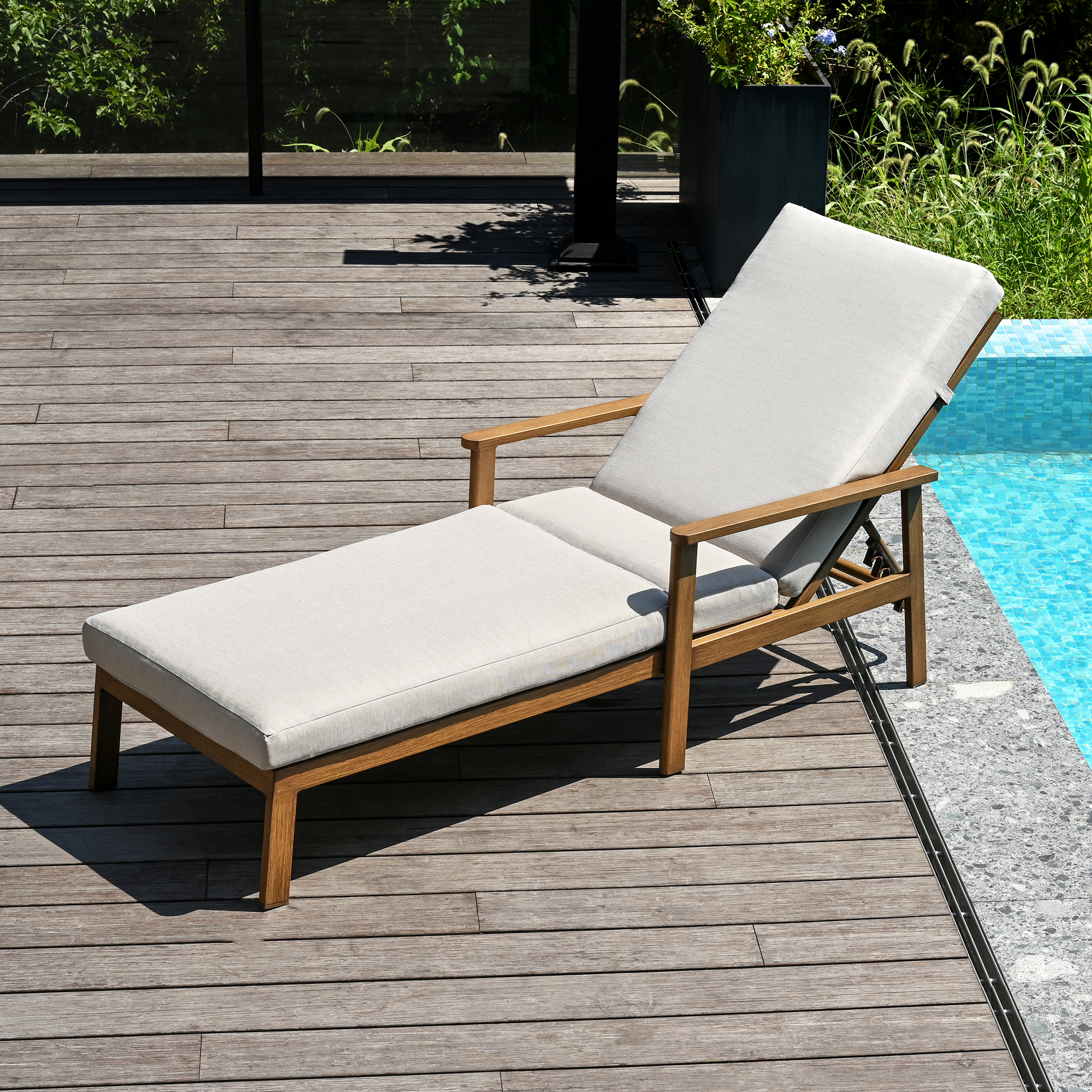 Outdoor lounge chair with thick cushions and adjustable backrest by the poolside-Seehill