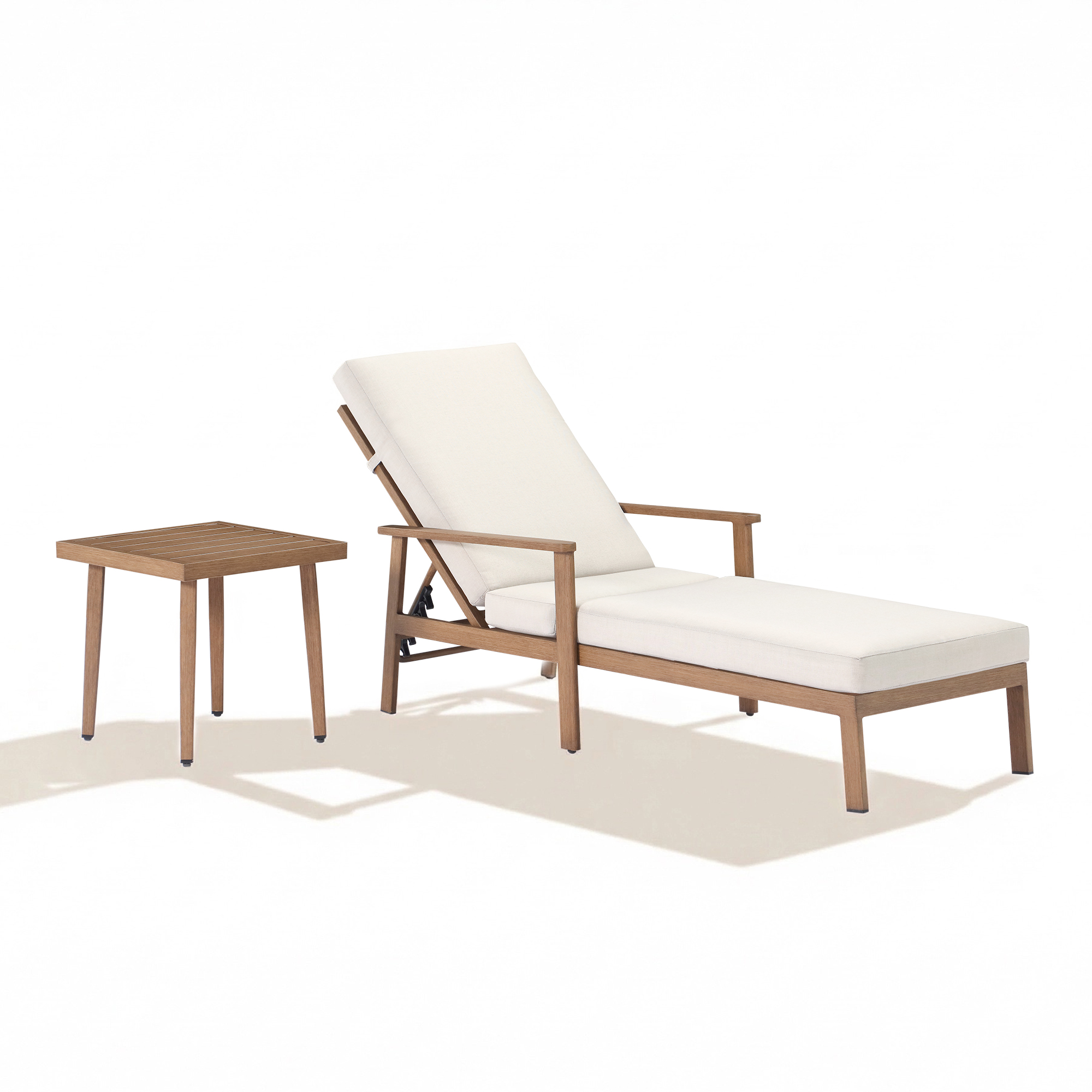 Outdoor lounge chair with thick cushions and adjustable backrest next to a wooden side table-Seehill