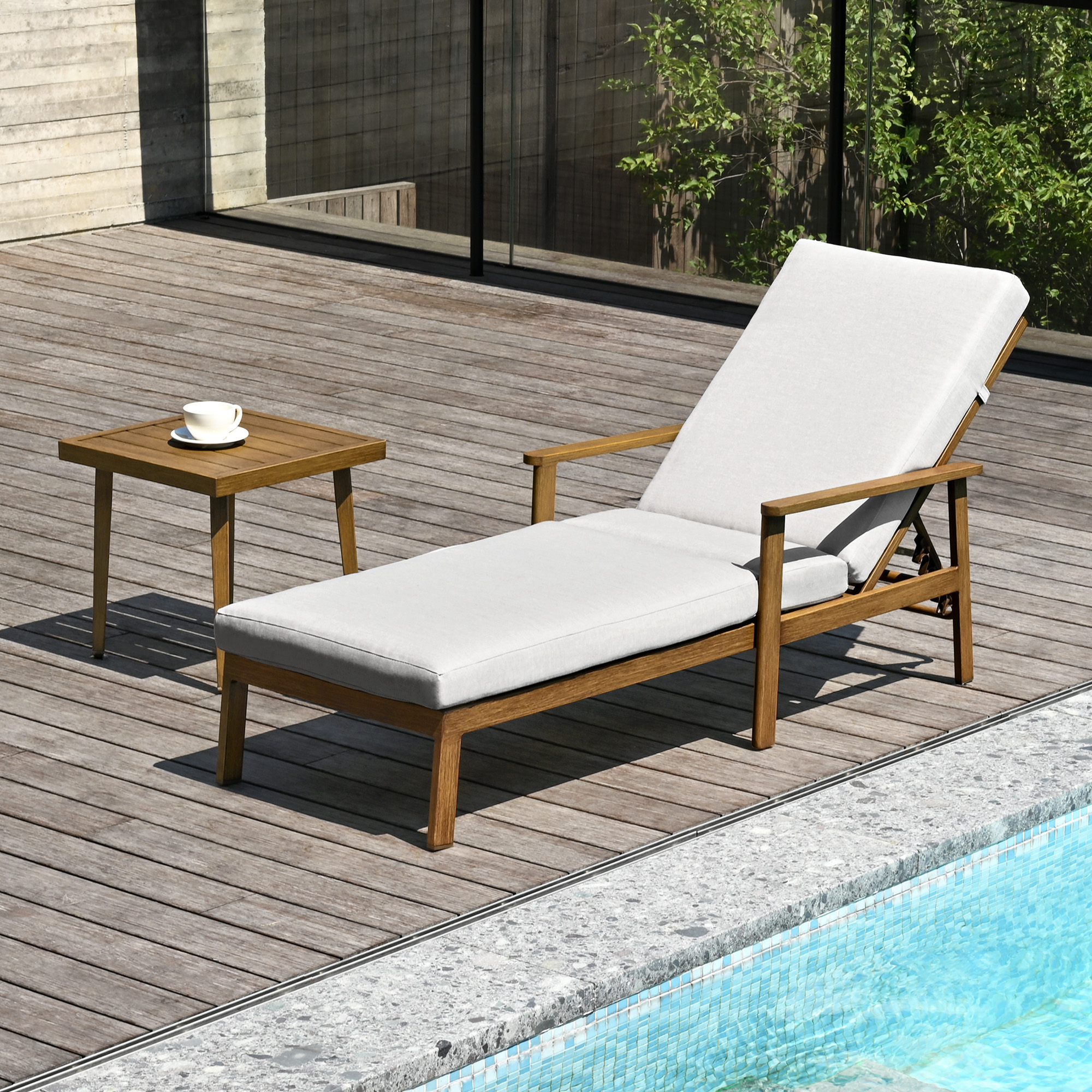 Outdoor wooden lounge chair with thick white cushions and adjustable backrest by the pool-Seehill