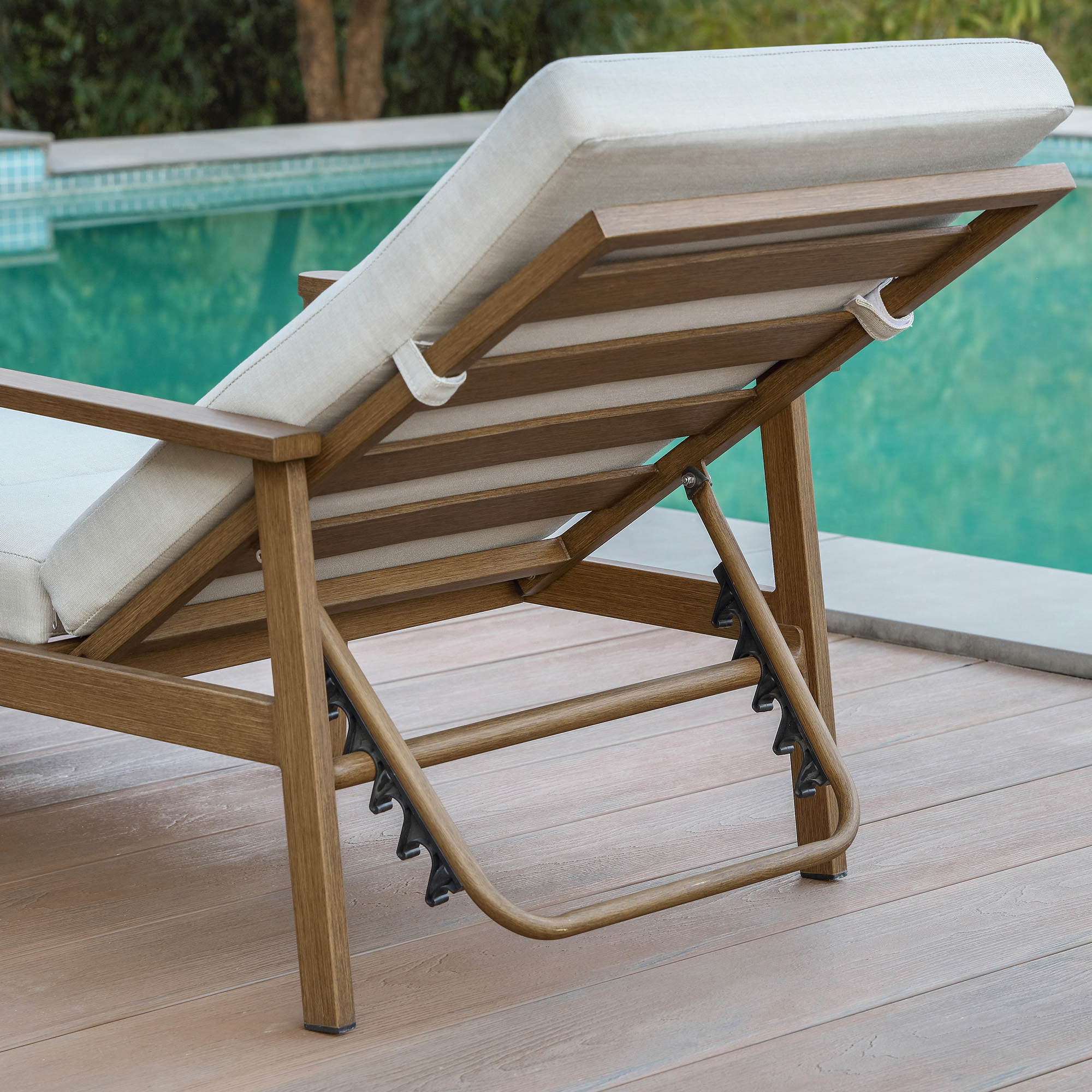 Adjustable outdoor pool lounge chair with thick cushions and wood finish frame-Seehill