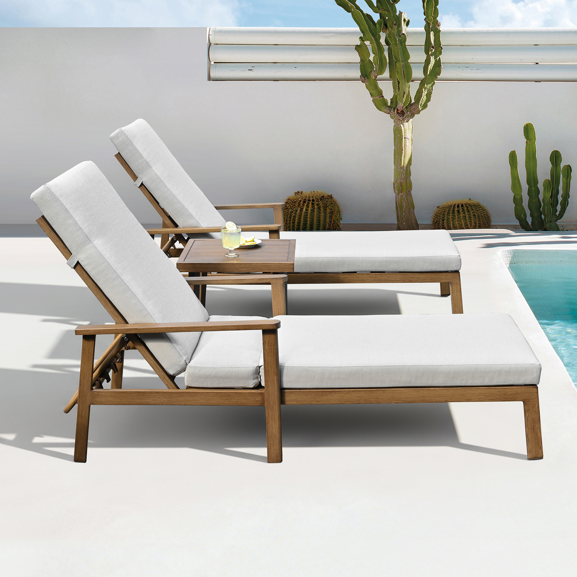 Ember Two adjustable outdoor lounge chairs with thick cushions and a square side table by-Seehill