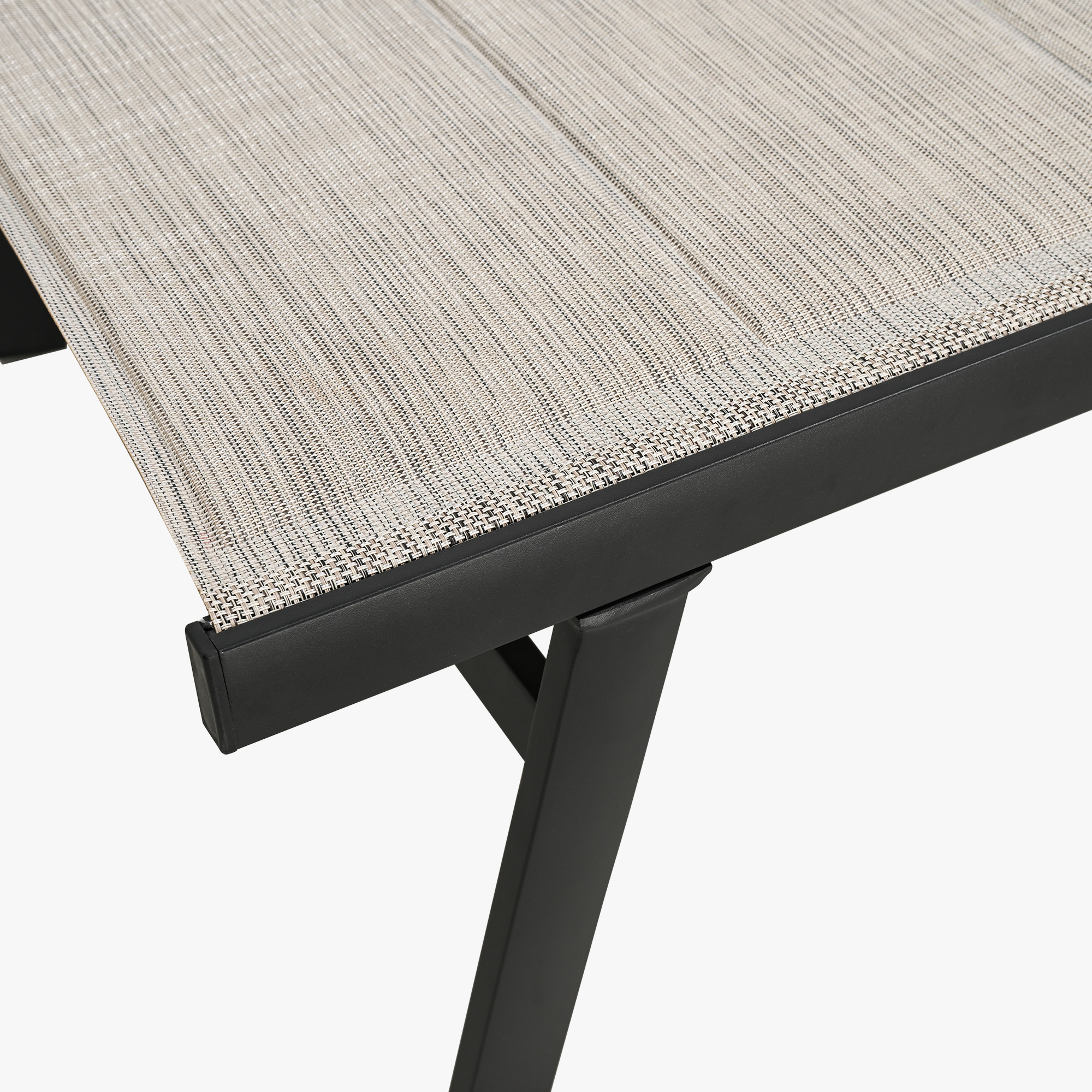Experience the modern outdoor table with a woven top and black metal frame in our sophisticated patio collection. - Seehill