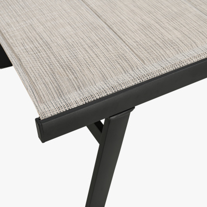 Modern outdoor table with woven top and black metal frame - Seehill