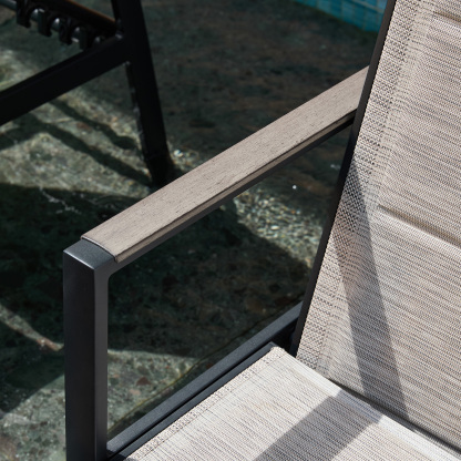 Outdoor lounge chair with wooden armrest and beige fabric seat - Seehill