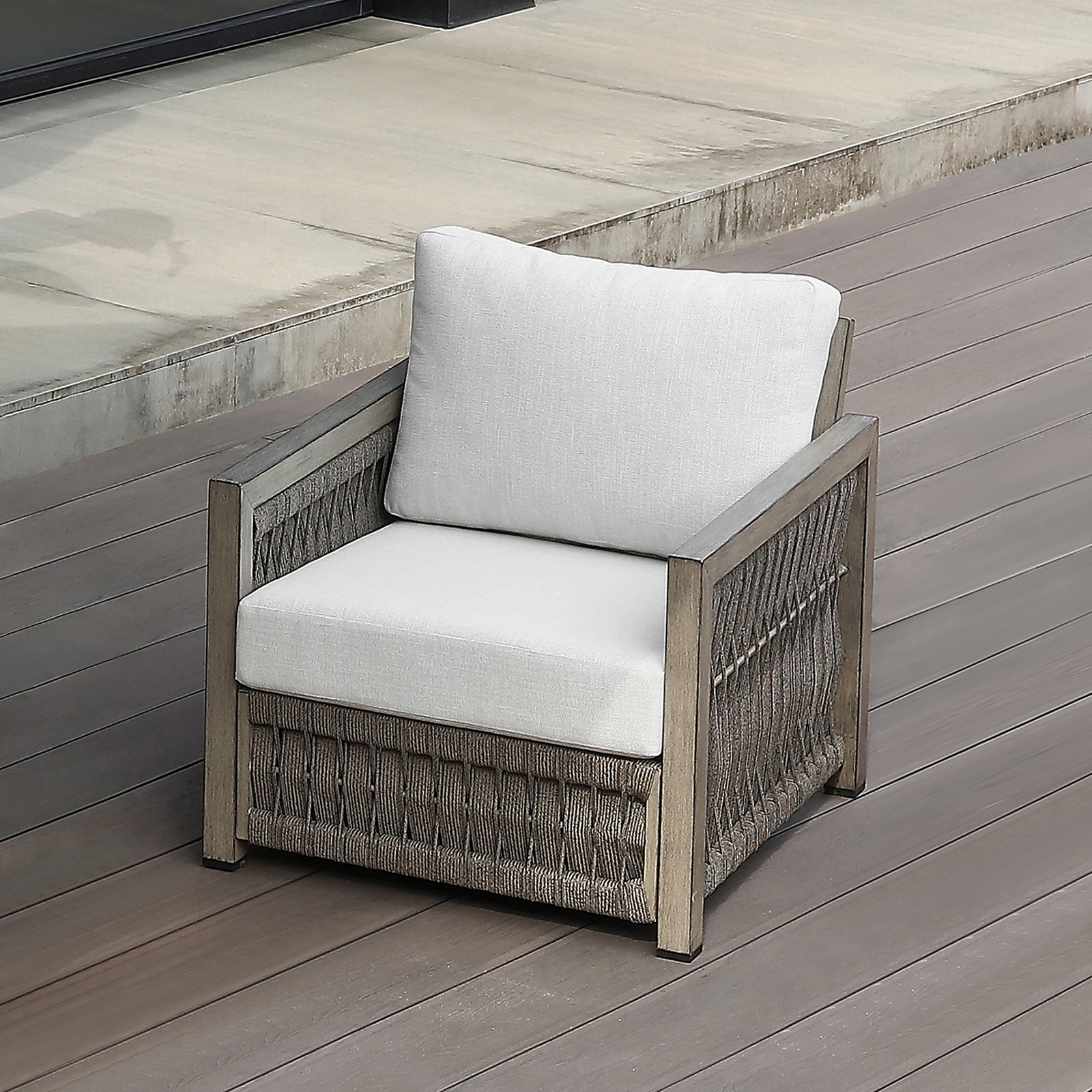 Outdoor wicker armchair with light gray cushions and wooden frame - Seehill