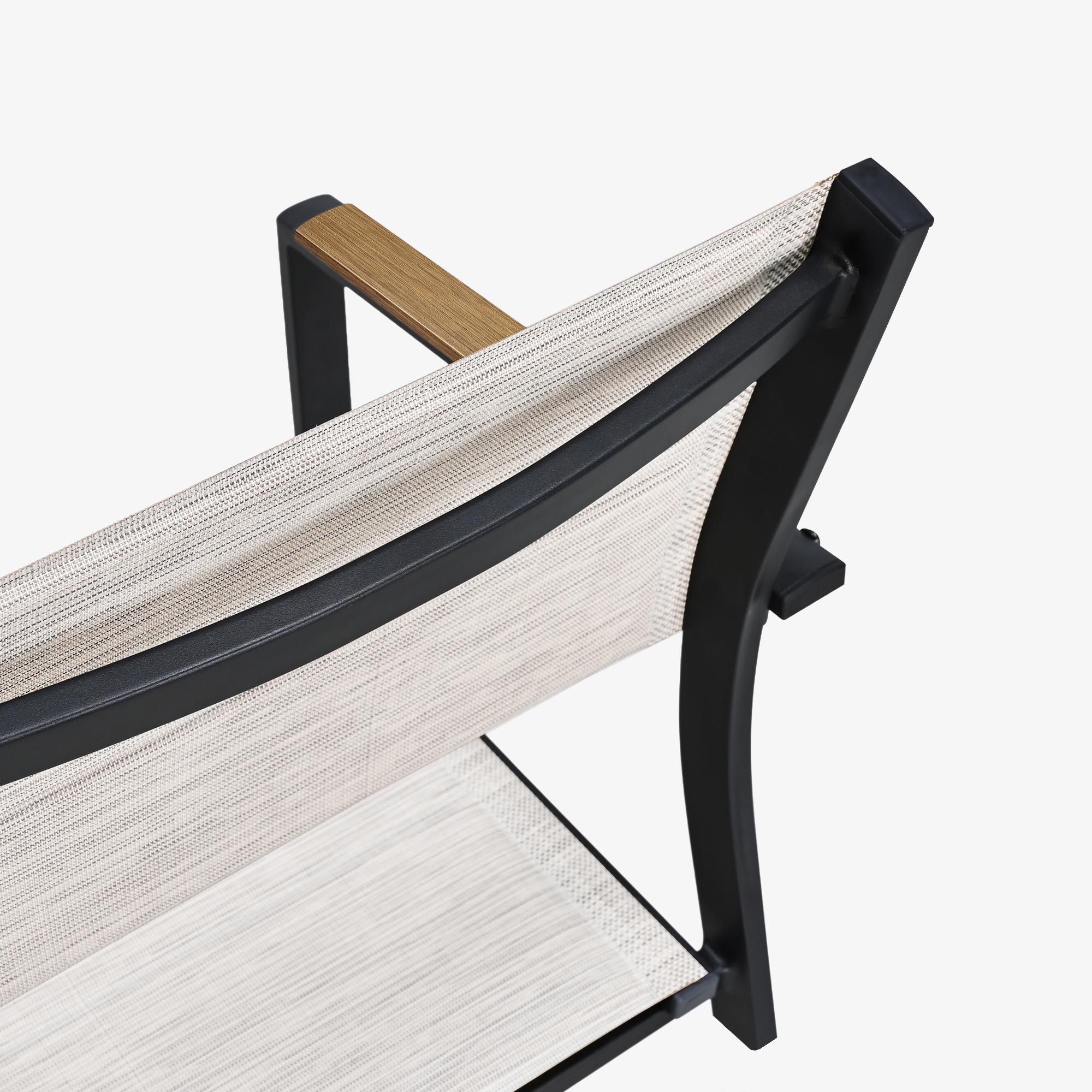 Close-up of beige mesh fabric and black metal frame with wooden armrest detail on patio-Seehill
