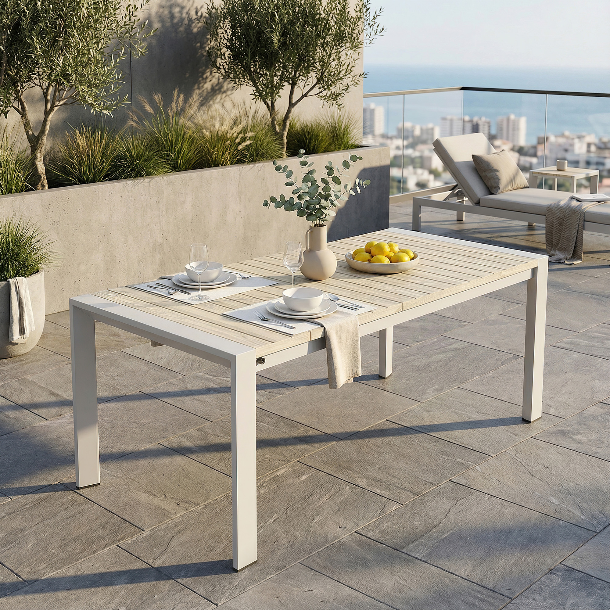 An elegant extendable outdoor dining table for eight persons with a modern light wood finish and clean lines. - Seehill