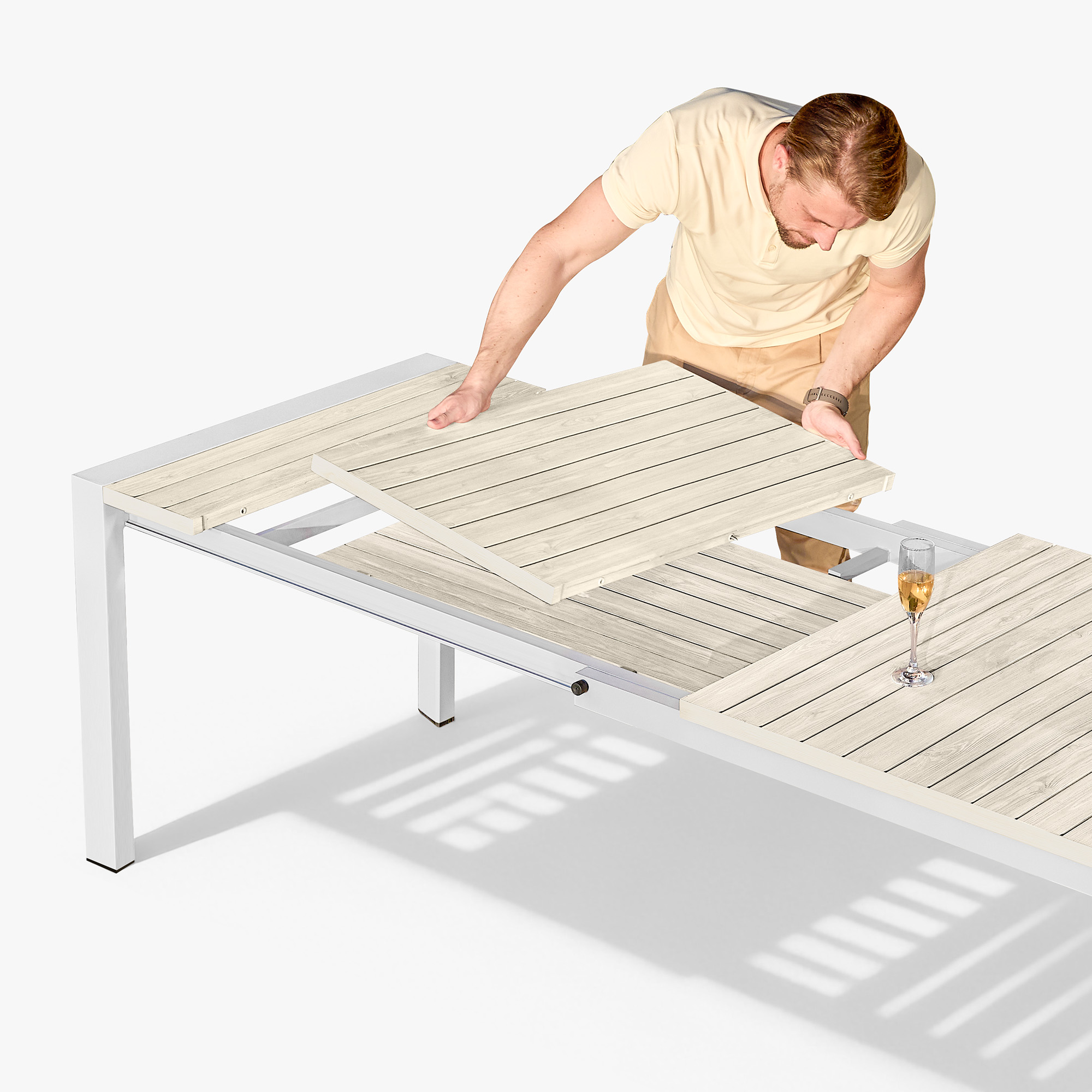 Experience the extendable outdoor dining table with a wood-effect top and metal frame in our opulent outdoor furniture collection. - Seehill