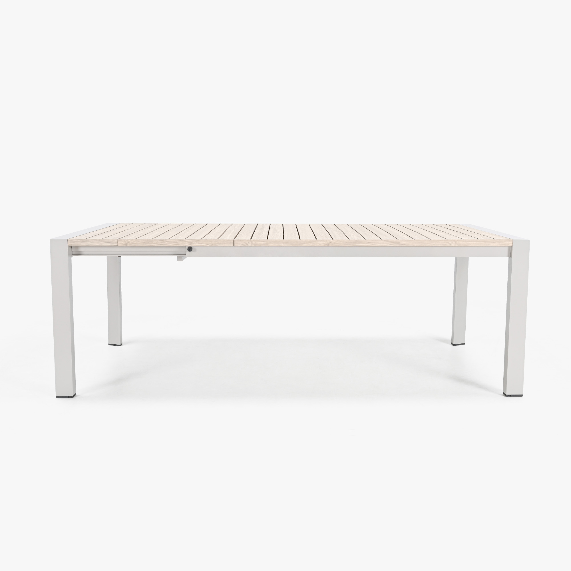 This extendable outdoor dining table for eight persons provides a sophisticated feel with a modern extendable mechanism. - Seehill