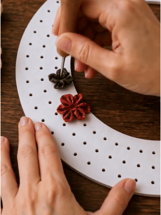 Making fabric flowers on Christmas wreath