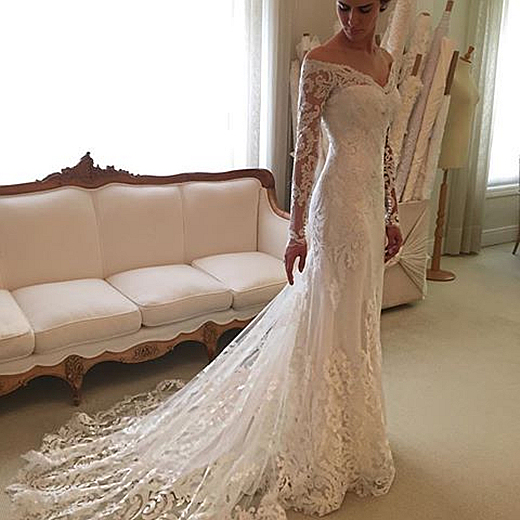 Forme trompette robe de mariée avec manche longue en dentelle délicat traine alayage