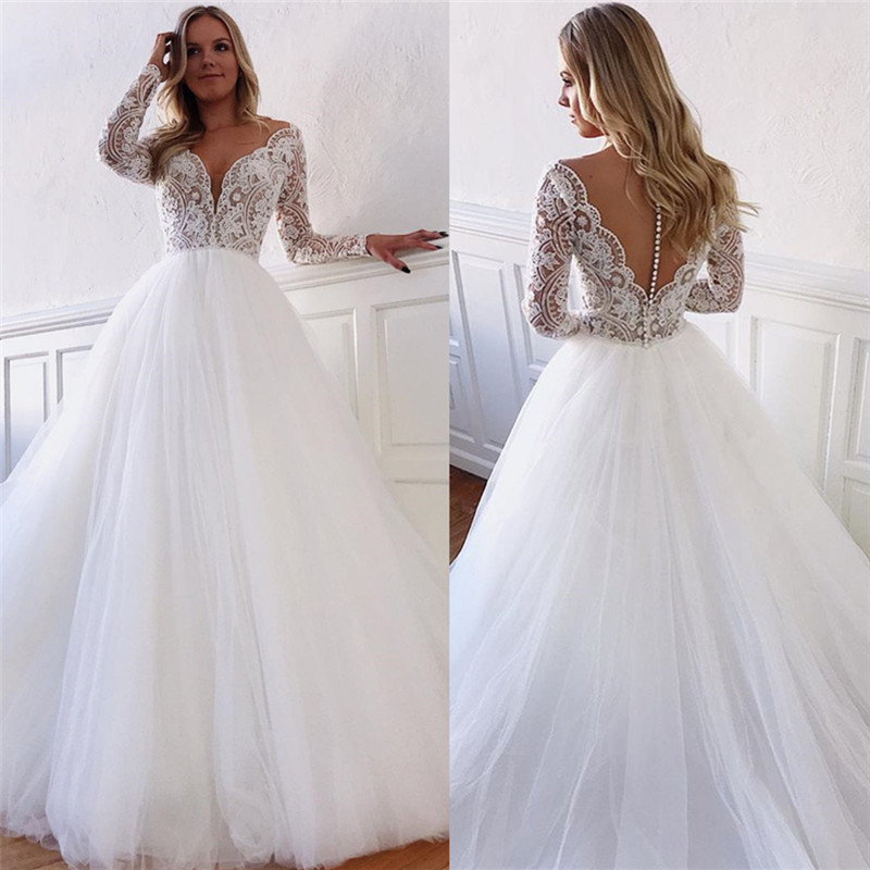 robe de mariée longue princesse en dentelle avec manches longues
