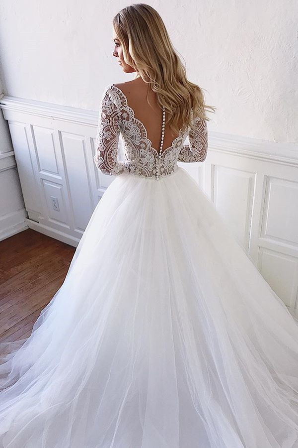 robe de mariée longue princesse en dentelle avec manches longues