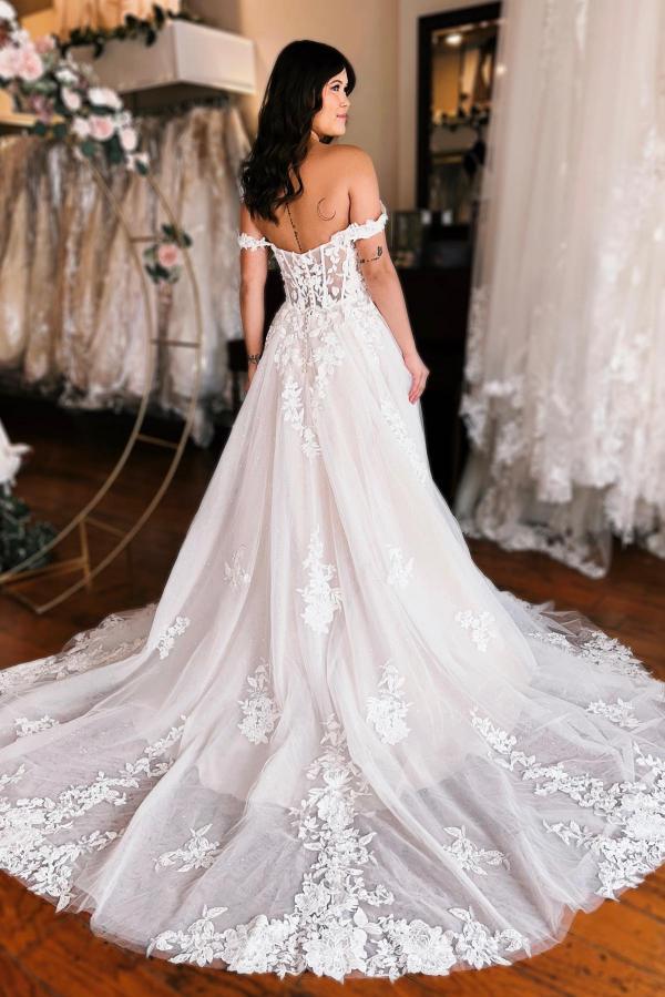 Robe de mariée ligne A dentelles fleuries bon tissue pas cher