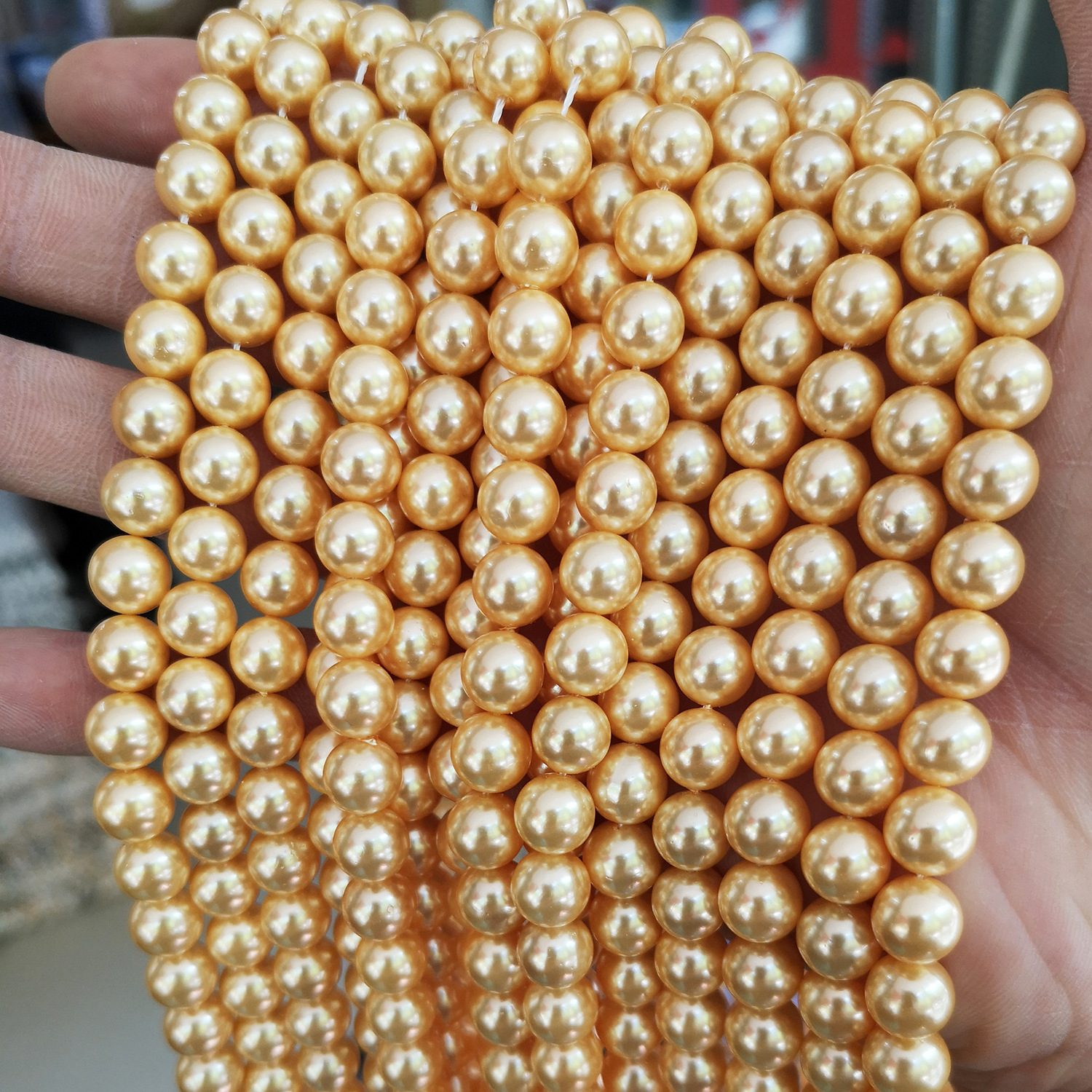 Pearls with holes punched for DIY use