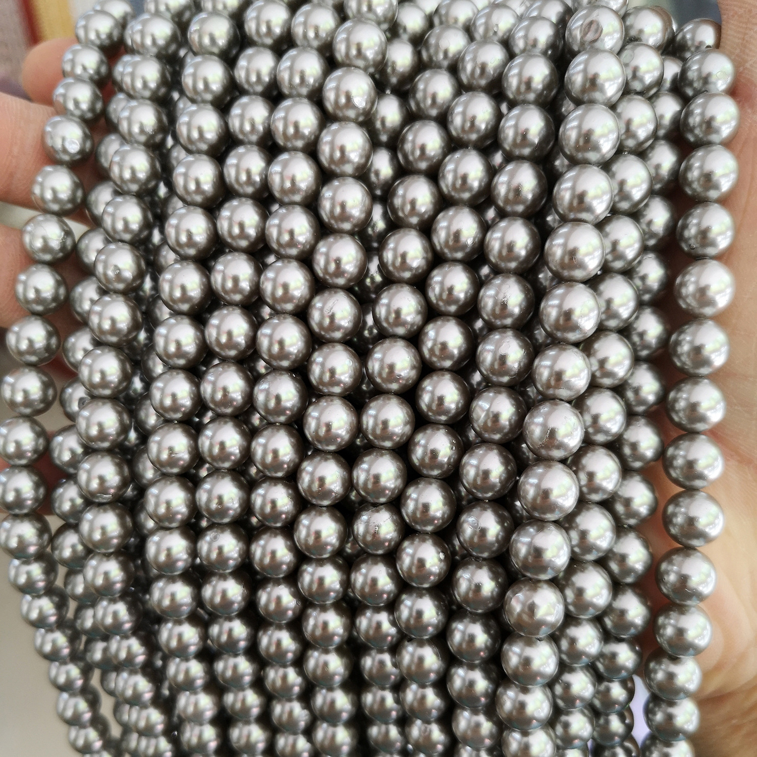 Pearls with holes punched for DIY use