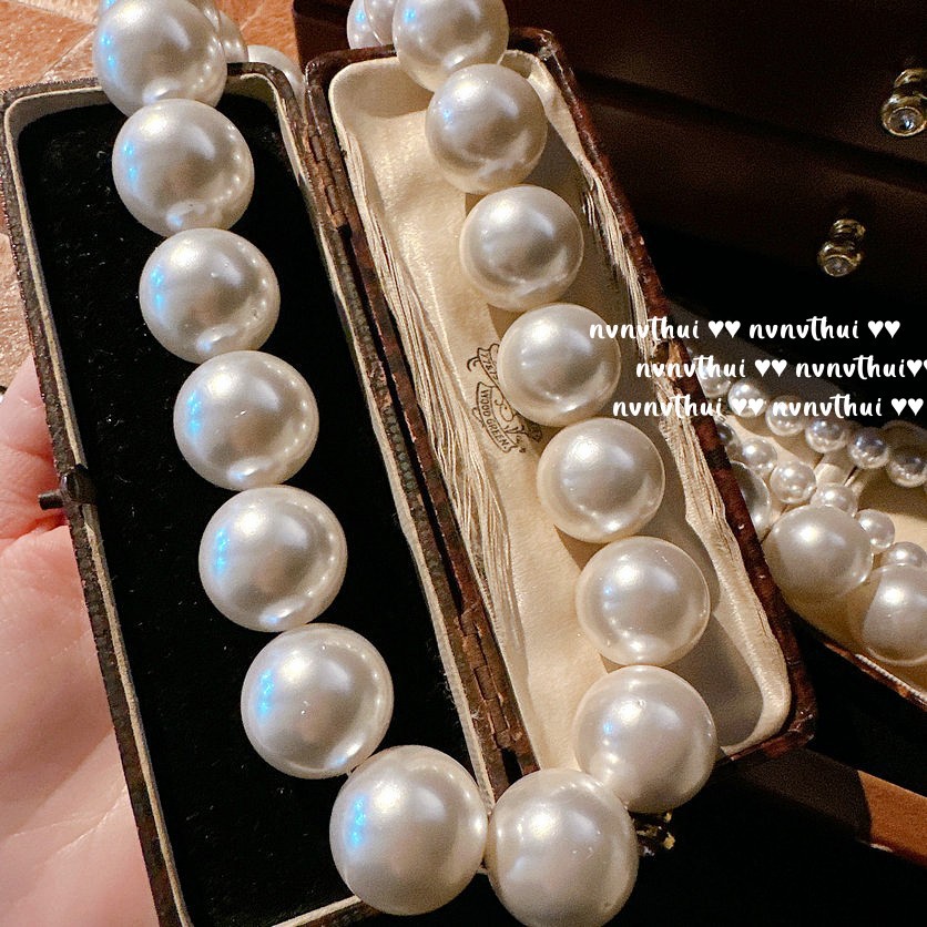 "Mermaid's Tears: Opulent Pearl Necklace"--13mm