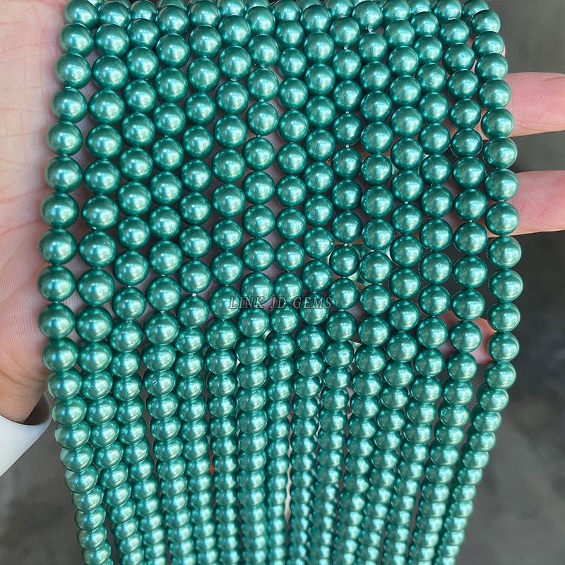 Pearls with holes punched for DIY use