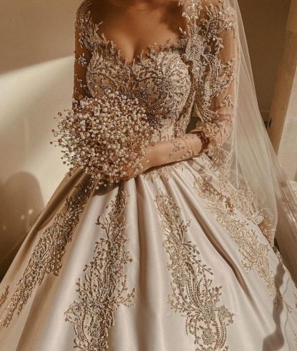 Gorgeous Sweetheart Long Sleeve Beading Satin A-line Wedding Dress