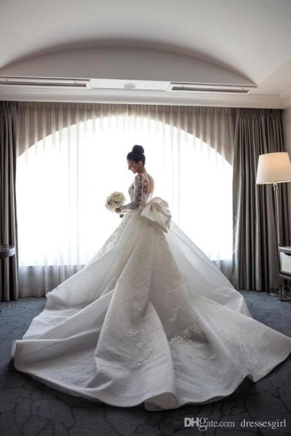 Gorgeous Long Sleeves Lace Tulle Mermaid Wedding Dress with Bowknot
