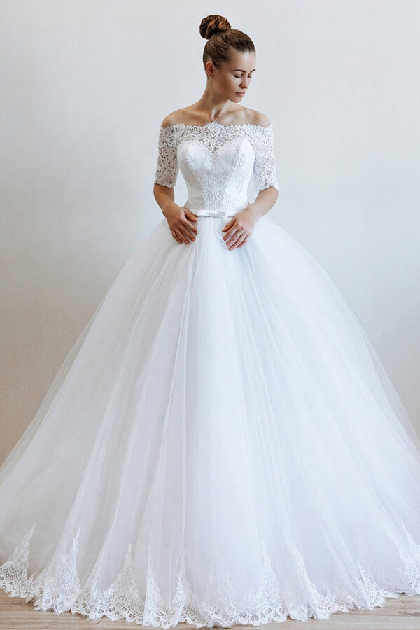 Off the shoulder lace and tulle ball gown wedding dress with sleeves