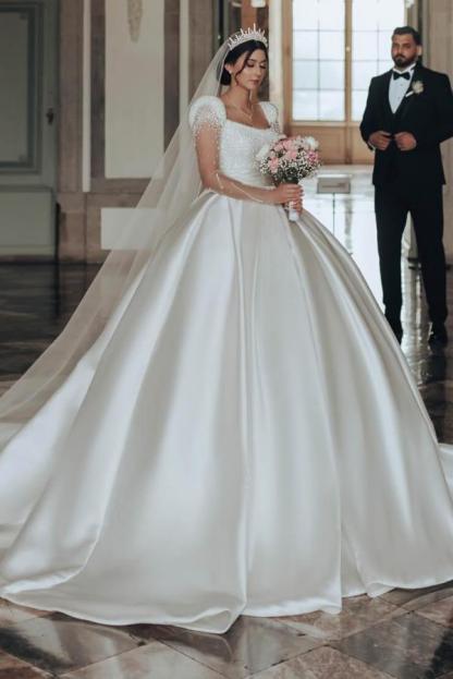 Gorgeous White Long Sleeves Ball Gown Floor length Wedding Dress with Beads