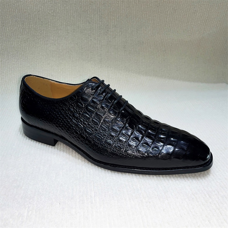 New crocodile-embossed leather shoes