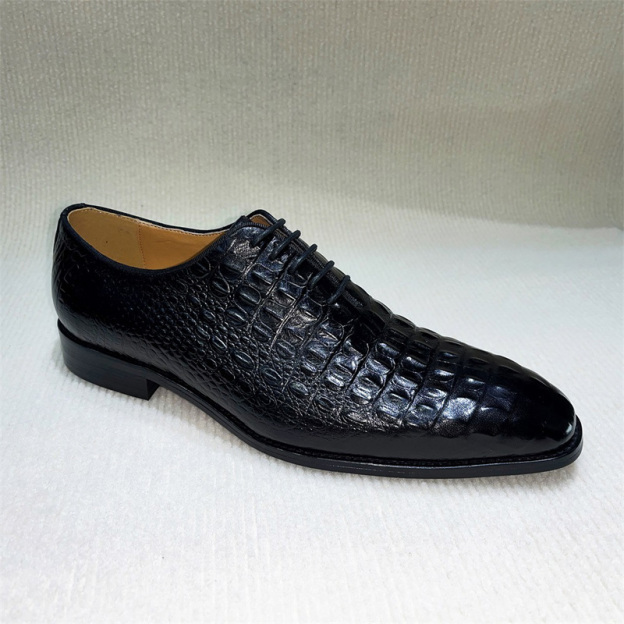 New crocodile-embossed leather shoes