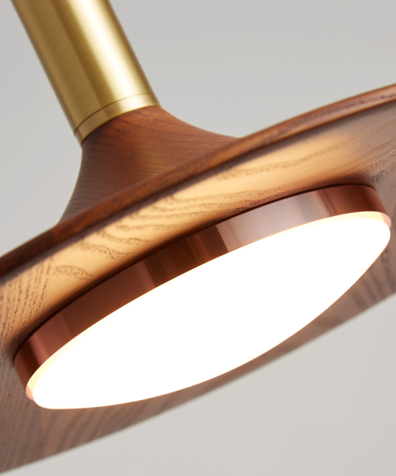 Carins Vintage Walnut Pendant Light detail, showing warm light and wood grain