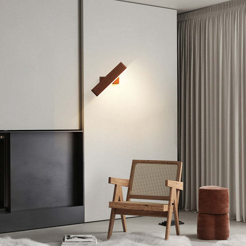 Aqsa metal rotatable wall lamp in living room. Modern lighting.