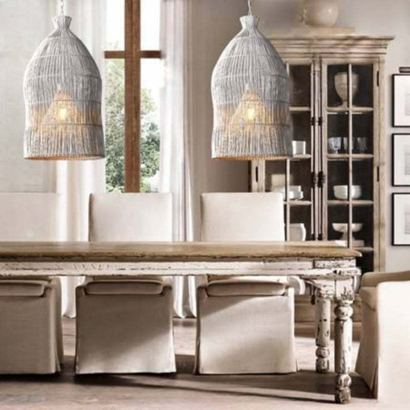 Muto Birdcage LED Pendant Lights illuminating dining room
