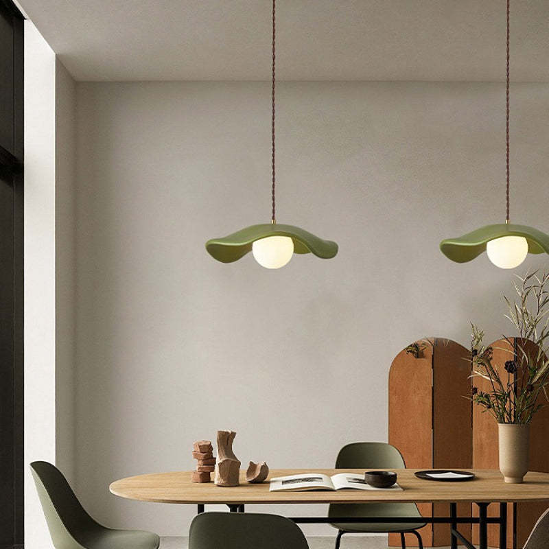 Green Byers Nordic pendant lights in a dining room