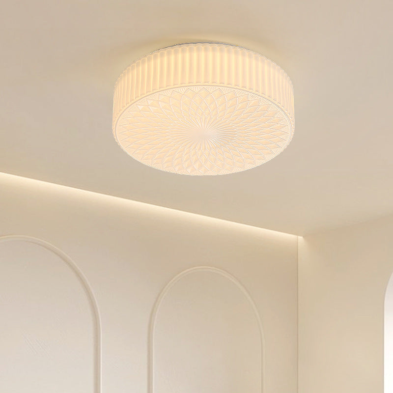 Cream-colored Hailie flush mount ceiling light, modern interior design