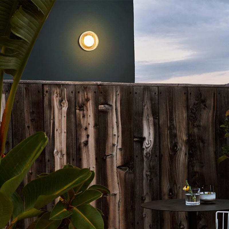Outdoor wall lamp illuminating patio, Valentina design