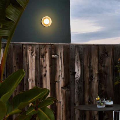 Outdoor wall lamp illuminating patio, Valentina design