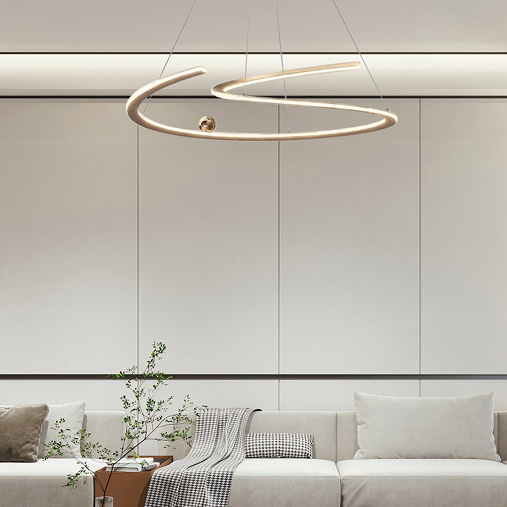 Modern linear pendant light in living room, gold finish