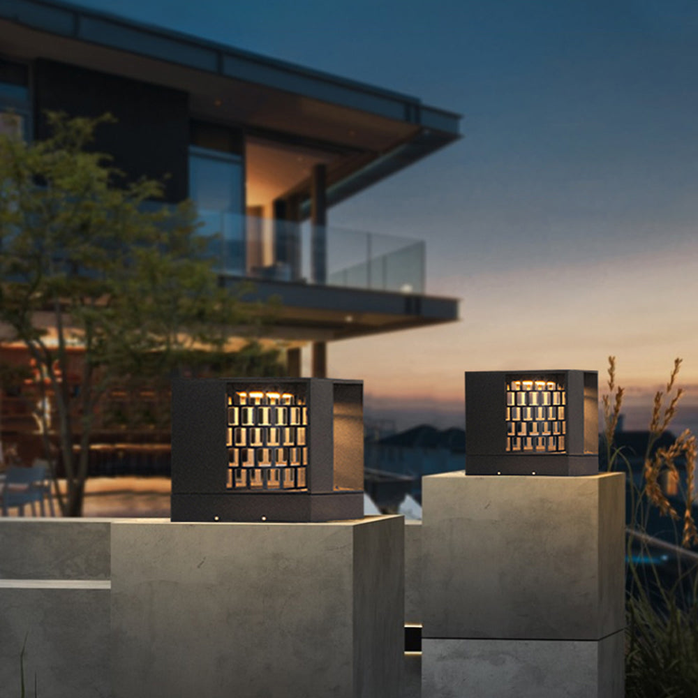 Modern Riley Outdoor Pillar Lights illuminating a patio