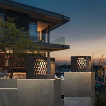 Modern Riley Outdoor Pillar Lights illuminating a patio