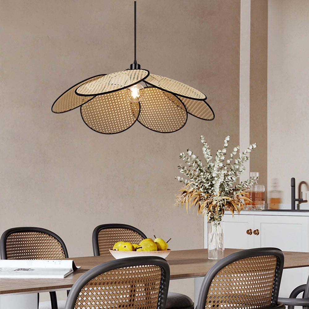 Ritta rattan pendant light above dining table.