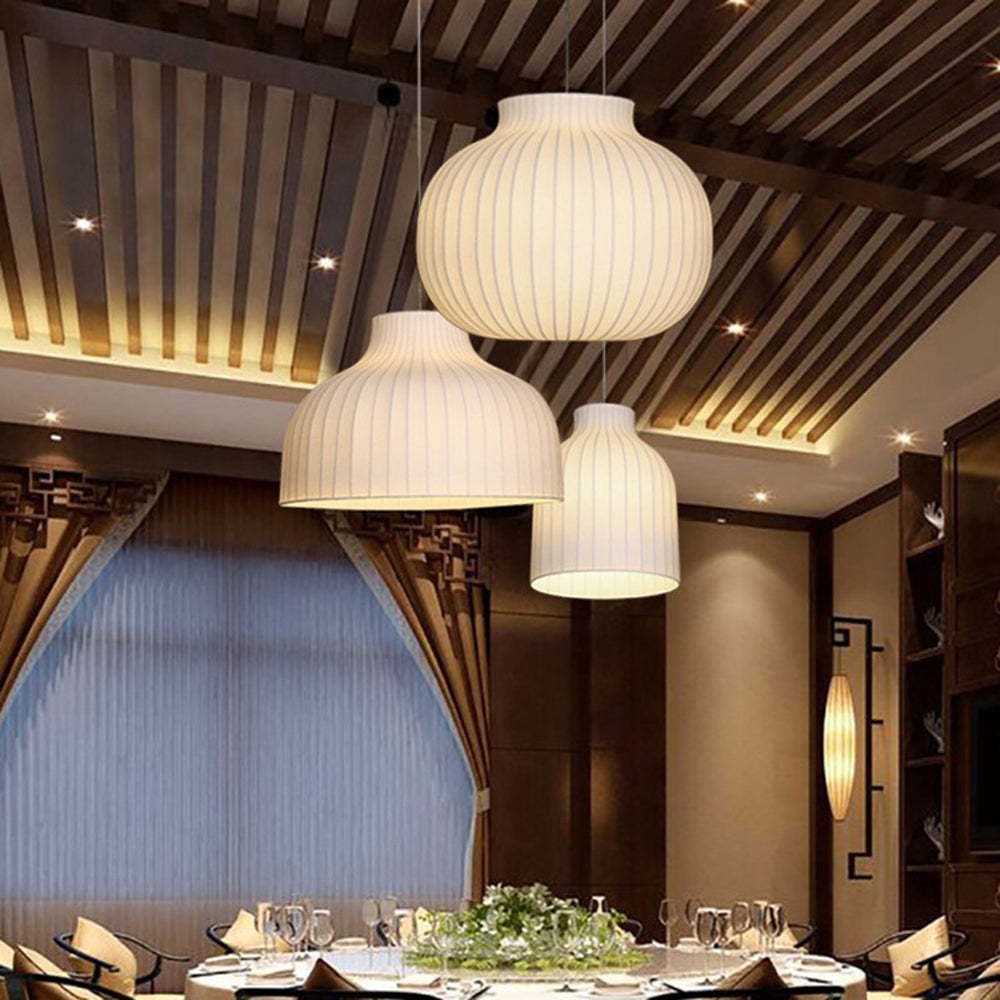 Renée pendant lights over dining table