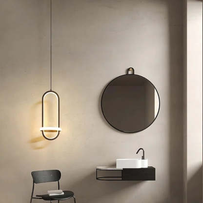 Nyla pendant light illuminating a minimalist bathroom
