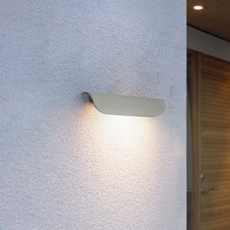 Orr Modern Curved Outdoor Wall Lamp illuminating wall