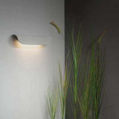 Modern outdoor wall lamp with curved design, garden lighting