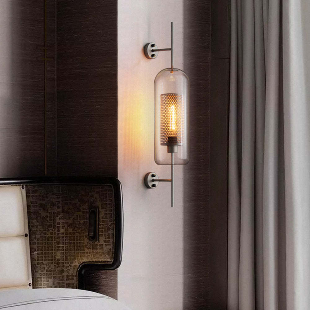 Industrial glass wall lamp in a bedroom setting
