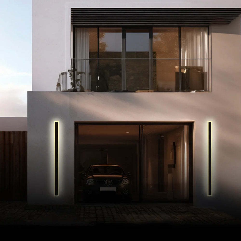Modern Edge outdoor wall lamp illuminating a home entrance. Edge Radiation Linear Metal Acrylic Outdoor Wall Lamp Garden Corridor
