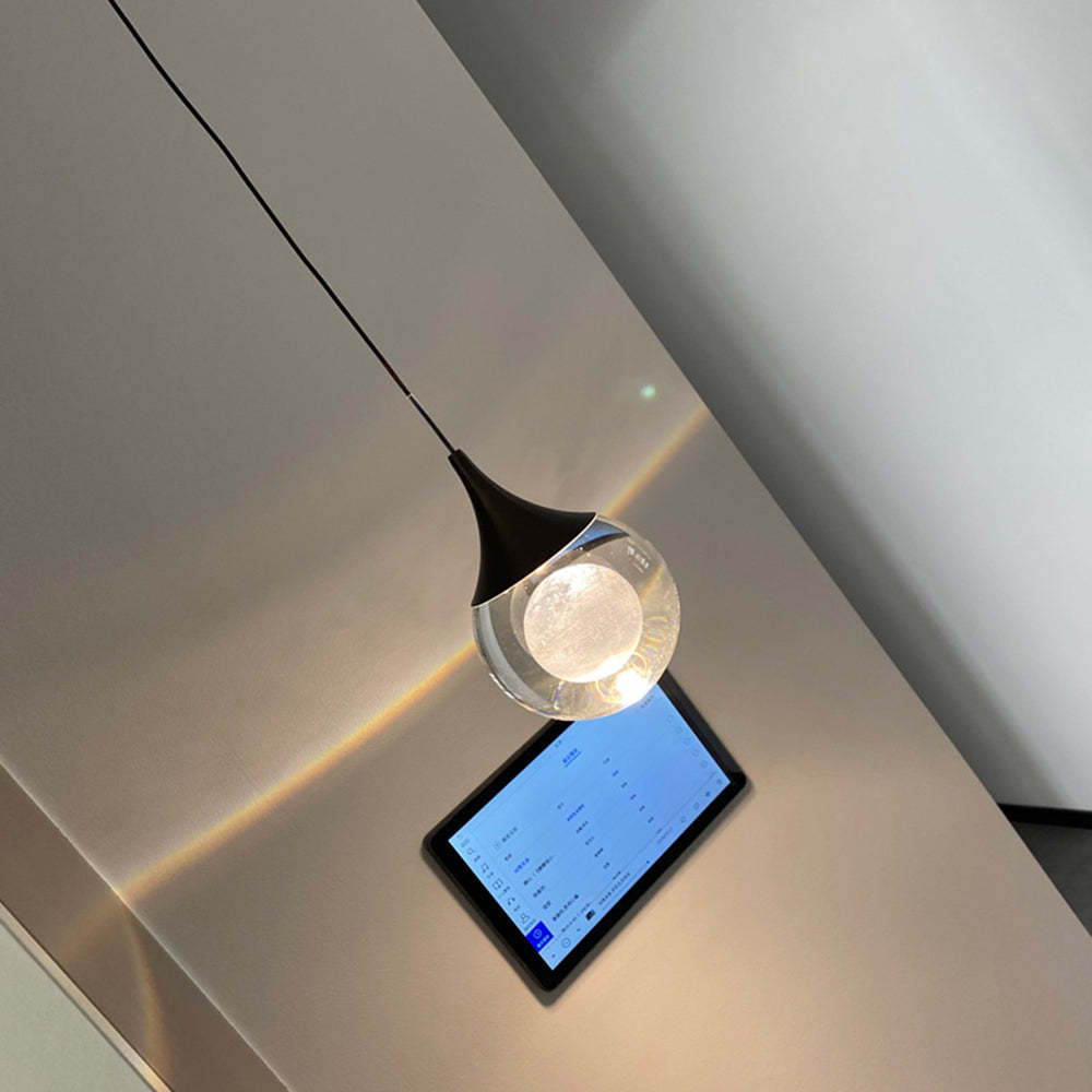 Elif Moon Pendant Light over tablet