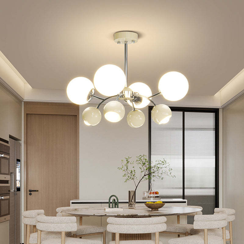 Modern Orb Chandelier above dining table