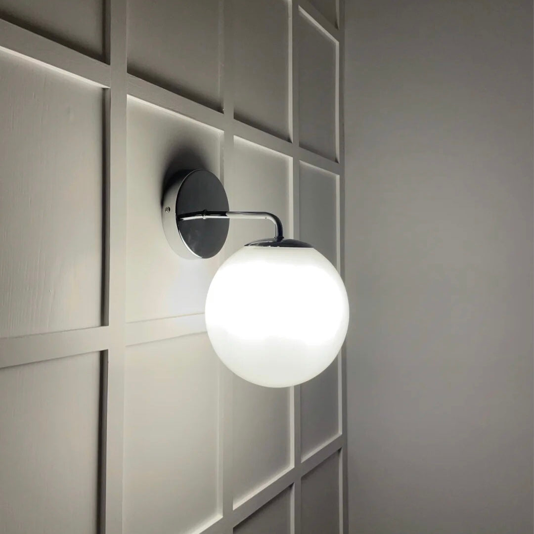 Valentina Wall Lamp illuminating a bedroom